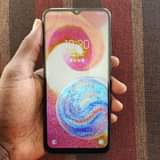 A picture of samsung A04e 0655695769 32gb BEI 170 000 ram 3gb face