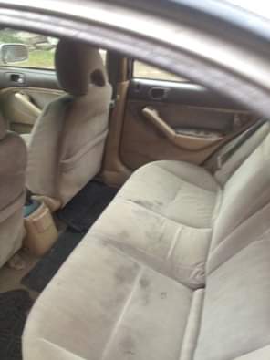 A picture of Honda civic 2003 model up for grab Engine is working