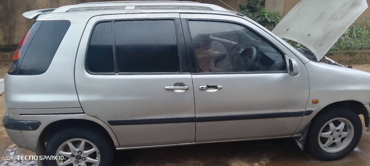 A picture of Toyota Raum UAL 003K