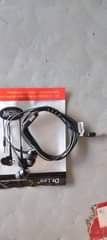 A picture of Charger cables and Dr Lee headsets