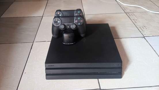 A picture of ps4 pro two controllers