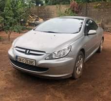A picture of Direct Tokunbo Silver Peugeot 307 cc 2006 Manual Convertible Manual