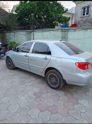 A picture of Toyota Corolla 06 with everything perfect condition UNTEMPERED Price 2