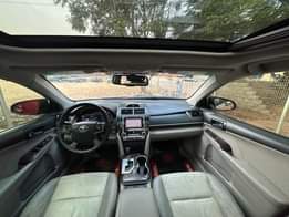 A picture of RADIANT TOYOTA CAMRY XLE V6 YEAR 2013 KEYLESS IGNITION LESS