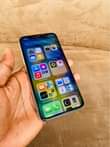 A picture of iPhone X 64Gb At 590k