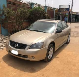A picture of STILL AVAILABLE Clean Nigerian Used Gold Nissan Altima 2004 Baked
