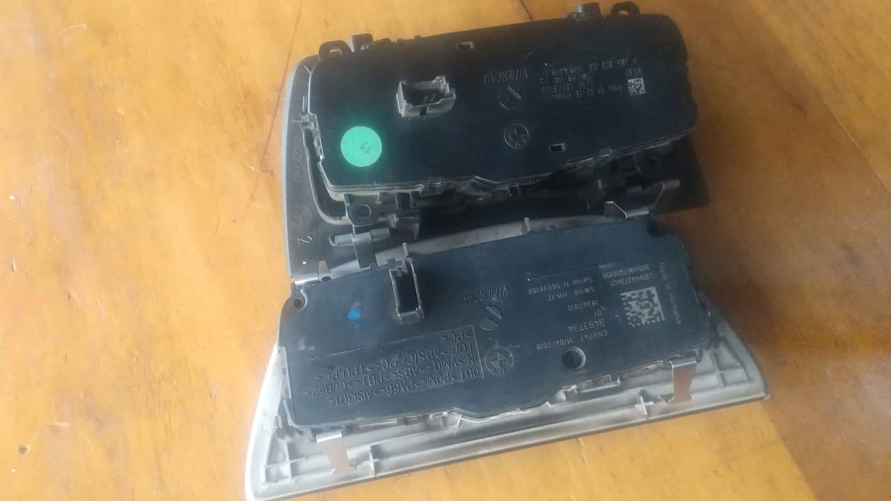 A picture of BMW headlight control button