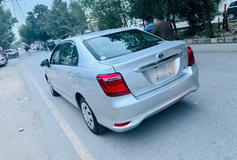 A picture of Toyota Axio Hybrid Model 2018 import 2022 RA Grade Auction