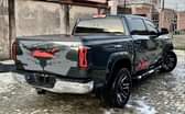 A picture of irect okumbo Toyota Thundra TRD Upgraded to ustom uty ntact