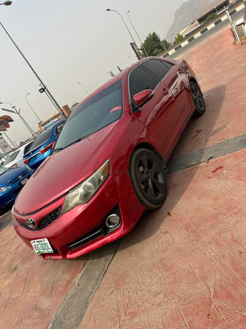 A picture of Mad distress sell Toyota Camry 2013 model SE everything is