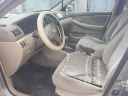 A picture of 9ja used Corolla 2004 LE First body first registration Engine