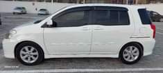 A picture of White Toyota Raum For Sale