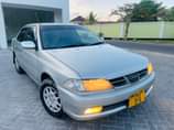 A picture of TOYOTA CARINA TI YEAR 2000 PRICE 8 8M CALL 0621007902