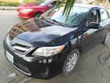 A picture of 2012 Toyota Corolla first body pan no Nigeria paint Price