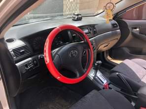 A picture of Toyota Corolla obama few months used with original duty 1