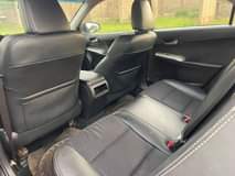 A picture of CLEAN REGISTERED 2014 TOYOTA CAMRY SE 5 3M NET PRICE