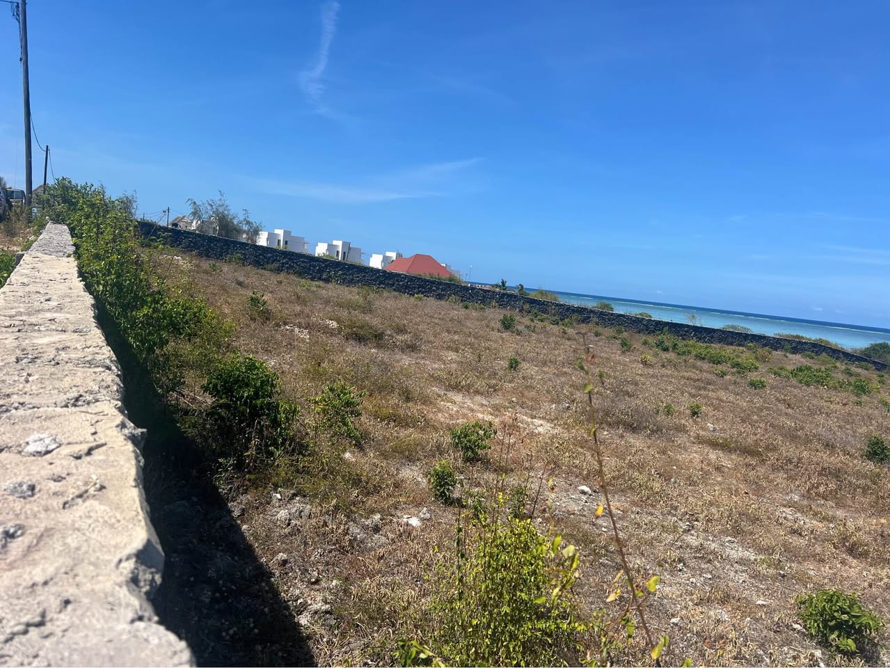 A picture of A beachfront plot on the cliff is available for sale