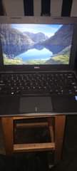 A picture of Dell latitude Celeron portable laptop at 450 000