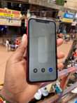 A picture of iPhone XR 64gb Face ID True Tone Battery health 92