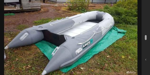 A picture of PVC inflatable boat 10 people in need of repair