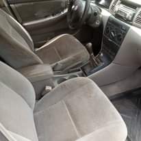 A picture of Corolla Engine and manual Gear working perfectly well Ac needs