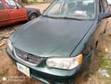 A picture of Toyota Corolla is available with good condition engine and gear