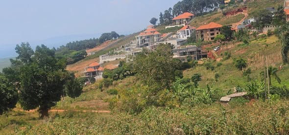 A picture of 25 DECIMALS AT BWEBAJJA DUNDU ENTEBBE ROAD WITH CLEAR LAKE