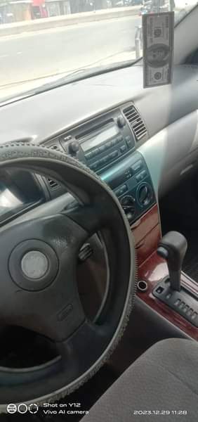 A picture of Christmas Deal Sharp Red Toyota Corolla 2005 First Body Engine