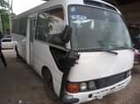 A picture of 2007 Toyota Coaster bus painted Sound engine and gear but