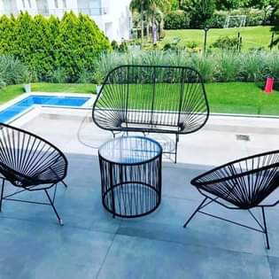 A picture of Chairs tables sunbeds etc