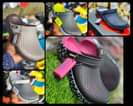 A picture of Crocs and shoes
