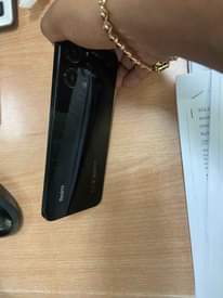 A picture of Mi note 12 in good condition gb128 ram6 ya mwaka