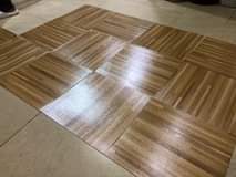 A picture of PVC Tile carpets 45000 per square meter and we also
