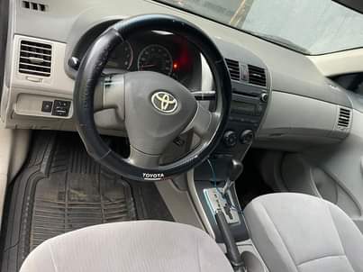 A picture of Few months registered 2010 Toyota Corolla LE flash on first