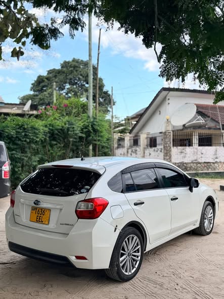 A picture of SUBARU IMPREZA NEW PRICE 13 900 000 TSHS CONTACT 0769265727