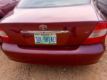 A picture of Distress distress own need money Camry 04 with good English