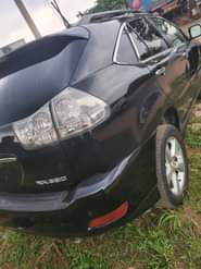 A picture of Lexus rx330 black with black interior Pure first body pan