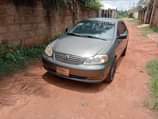 A picture of Neatly used Toyota corrola Buy And Drive First body Everything