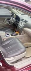 A picture of Toyota Camry 2010 model with chilling AC everything working Uyo