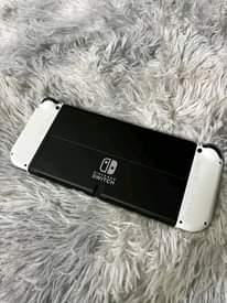 A picture of Used NINTENDO SWITCH OLED ON SALE CALL 0759592534