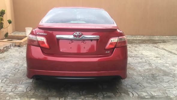 A picture of Very Sound Clean Red 2008 Registered Toyota Camry Sport Up
