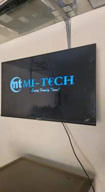 A picture of Mitech 32 smart tv frameless with also inbuilt free to
