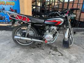 A picture of Nauza pikipiki used kama mpy call 0692530461