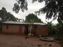 A picture of 2 fertile acres for sale with ready land on table