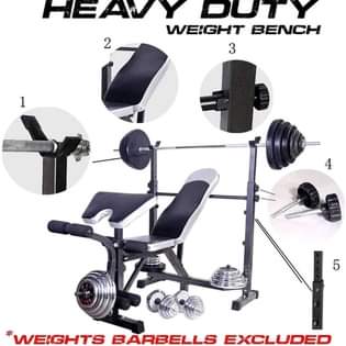 A picture of Gym equipments and dumbbells