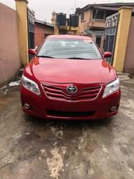 A picture of Fresh And Clean Toyota Camry LE On Ground Now For