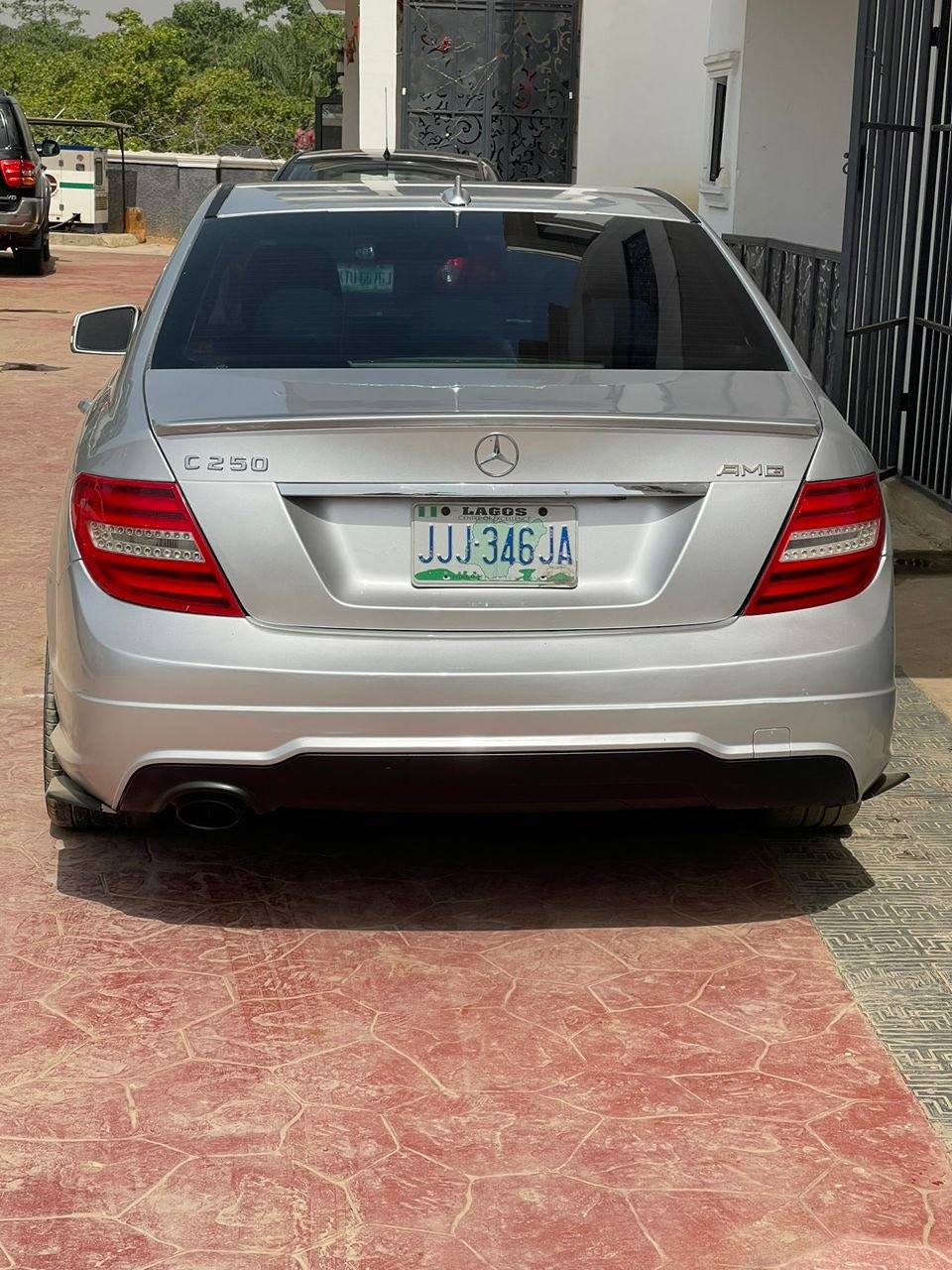 A picture of 2012 Mercedes Benz C250 super clean AC chilling everything intact.