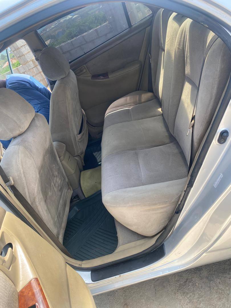 A picture of Newly painted 2006 Toyota Corolla with sound engine and gear