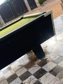 A picture of 8ft normal table foreign snooker table with 10coin and use