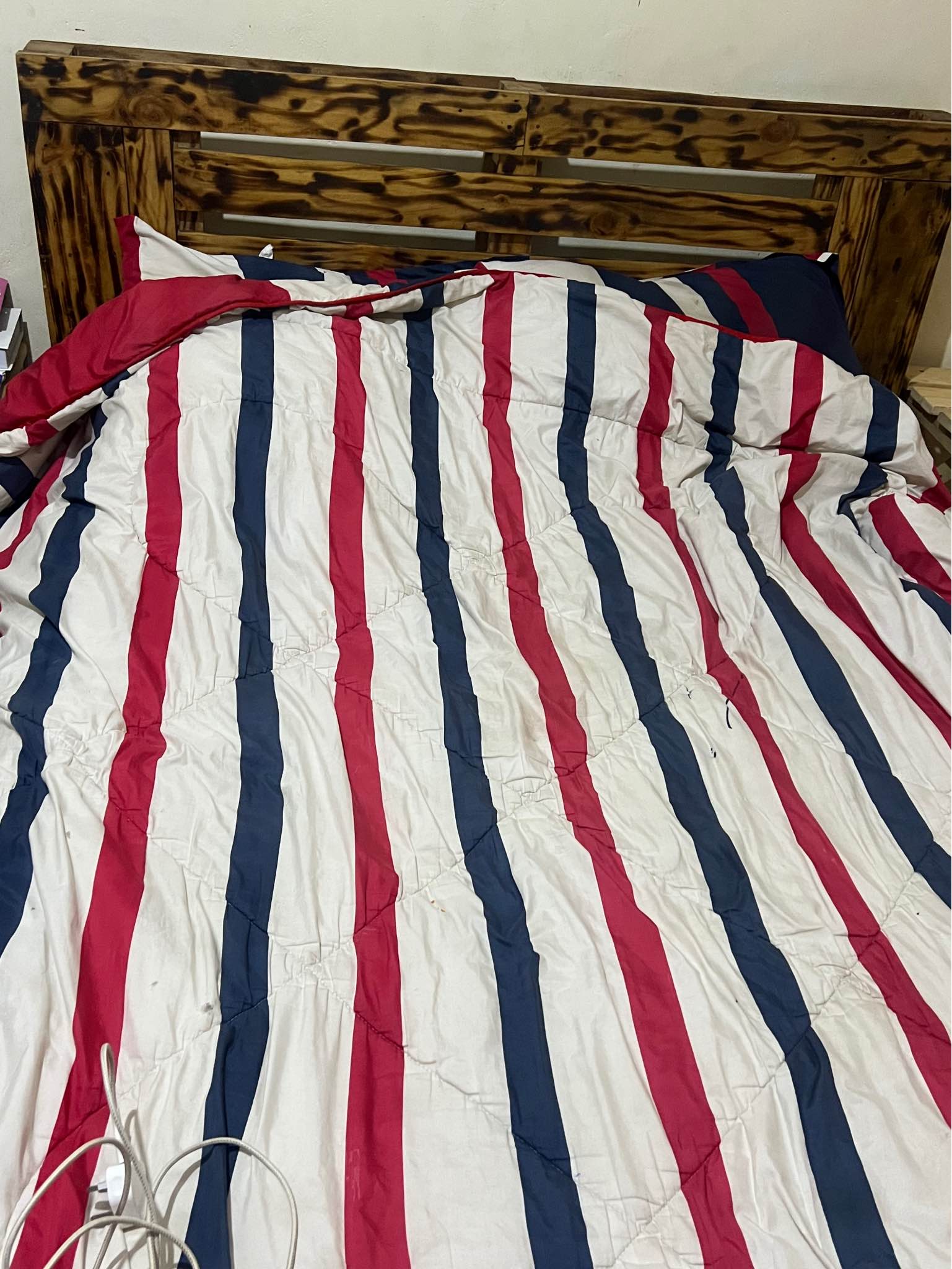 A picture of Poufs pallet bed shoe rack cloths rack double decker new